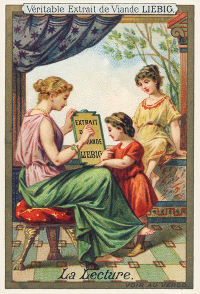 Reading. A young woman seated shows an advertising panel to two standing girls. Advertising chromolithograph, Liebig