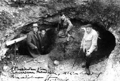 Leon Laval, Marcel Ravidat, Jacques Marsal and Abbot Breuil at the Entrance of the Cave of Lascaux, Montignac, France by Unbekannt