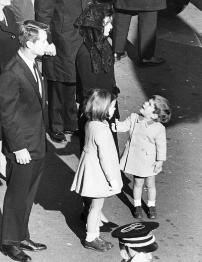 Little John Kennedy looks up at his mother, as if to say: 