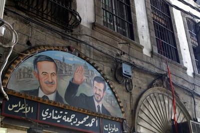 Painting by President Assad and his son Bassel above the souk in Damascus, Syria by Unbekannt