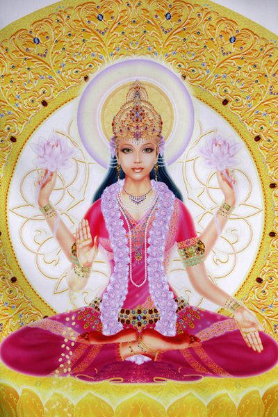 Picture showing Lakshmi, Goddess of wealth and consort of Lord Vishnu, sitting holding lotus flowers by Unbekannt