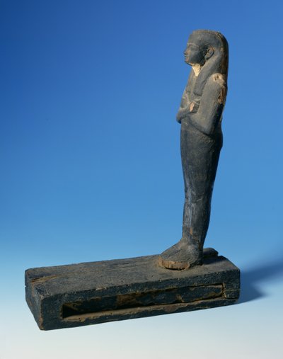 Ptah-Sokar-Osiris figure with tripartite wig and crossed arms on a rectangular plinth with a compartment containing a section of papyrus, Egyptian, 21st-22nd Dynasty, c.900 BC by Unbekannt