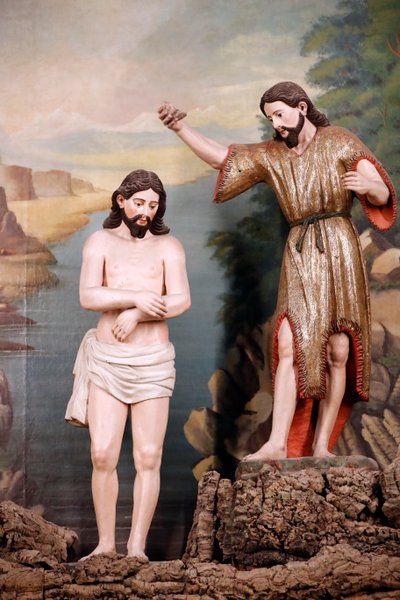 Saint Francis church. The Baptism of Christ by John the Baptist in the water of the river Jordan. Evora. Portugal. by Benjamin Baud