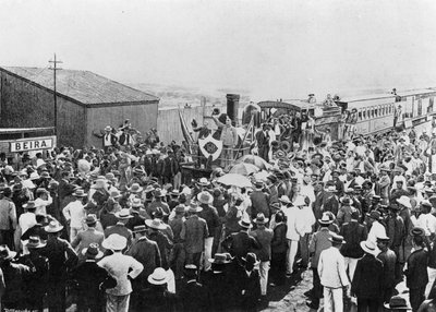 The Arrival of the First Train on the 2ft Gauge Railway to Beira, Mozambique by Unbekannt
