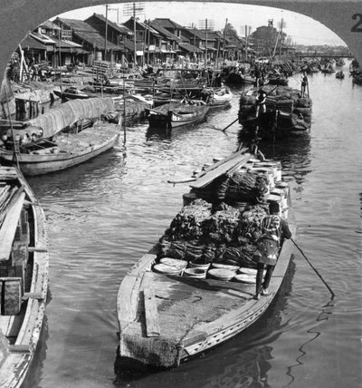 A Busy Freight Canal in Tokyo, Japan by Underwood and Underwood