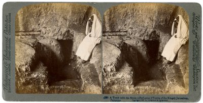 A tomb with the entrance stone rolled away, Jerusalem, 1901 by Underwood and Underwood
