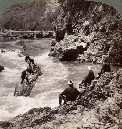 Men on a Log Raft, Shooting the Hozu Rapids on the Katsura River, Kyoto, Japan, 1904 by Underwood and Underwood