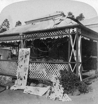 The Club which was struck by a 94lb Boer shell, siege of Mafeking, South Africa by Underwood and Underwood