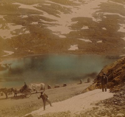 Travellers with July snowballs, on road over the Haukeli mountains, Norway by Underwood and Underwood