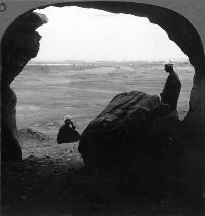 Walled City of El Kab, Seen from a Door of a Tomb in the Cliffs, Egypt by Underwood and Underwood
