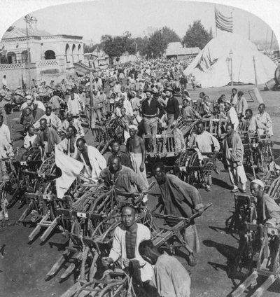 Wheelbarrow Transportation at the Boat Landing, Tianjin, China, 1901 by Underwood and Underwood
