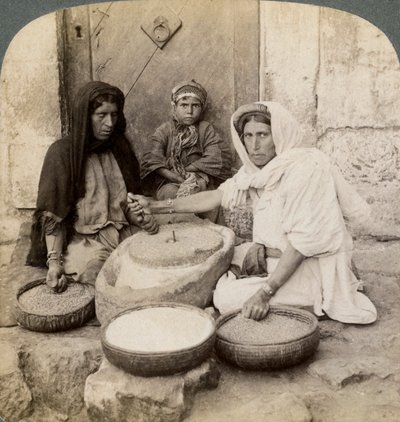 Women Grinding at the Mill, Palestine by Underwood and Underwood