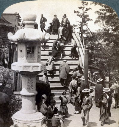 Worshippers Crossing the Semi-Circular Bridge to Kameido Temple Beyond, Looking North, Tokyo, Japan by Underwood and Underwood