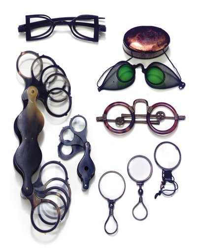 An Assorted Collection of Eyewear and Magnifiers by Unknown artist