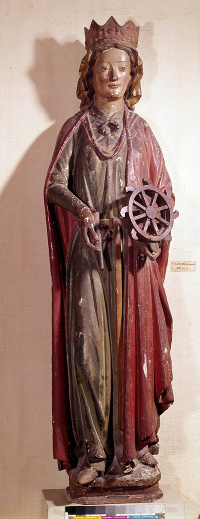 Representation of St. Catherine of Alexandria, holding the wheel instrument of her torment. Polychrome wooden statue by Unknown artist
