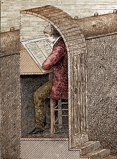 The blower in his hole. A theatre blower helps comedians remember their text when they