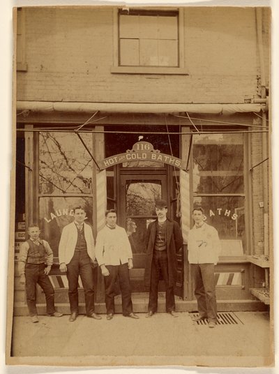Four Men and a Boy Standing in Front of a Public Bath House by Unknown artist