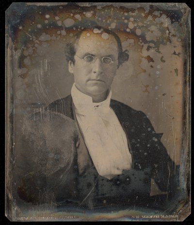 Portrait of a Seated Man Wearing Oval Wire-Rimmed Glasses by Unknown artist
