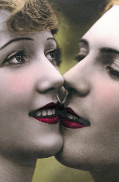 Close-up of Faces of Women Kissing by Unknown photographer