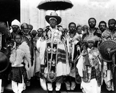 King Menelik II (1844 - 1913) surrounded by his court. Ethiopia. by Unknown photographer