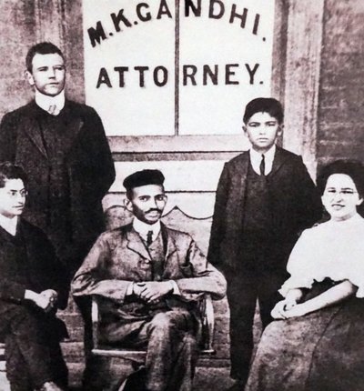 Mahatma Gandhi Sitting with Four Associates in Front of His Attorney Legal Practice Office at Johannesburg, South Africa by Unknown photographer