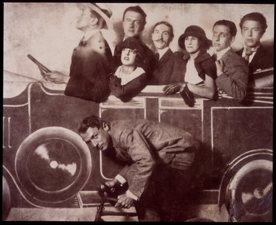 Max Morise, Simone Breton, Paul Eluard, Joseph Delteil, Gala Desnos, Andre Breton, and Max Ernst at the Foire de Montmartre by Unknown photographer