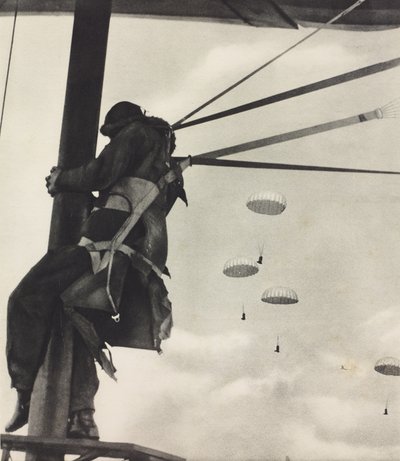 Moment before drop, RAF airman ready to leave aeroplane by parachute by Unknown photographer