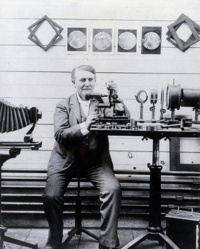 Photo of Thomas Alva Edison in front of his phonograph by Unknown photographer