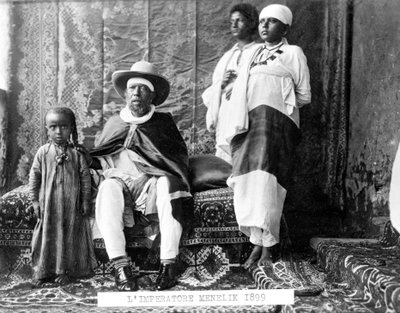 Portrait of Emperor Menelik II of Ethiopia (1844 - 1913) with his family. by Unknown photographer