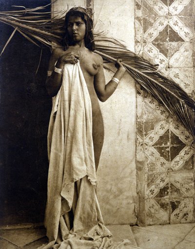 Young Berber woman posing naked. Photography around 1890 by Unknown photographer