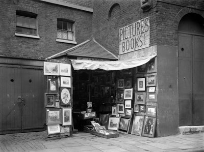 Framed Pictures Displayed Outside a Second Hand Book and Picture Shop, London by WA Clark