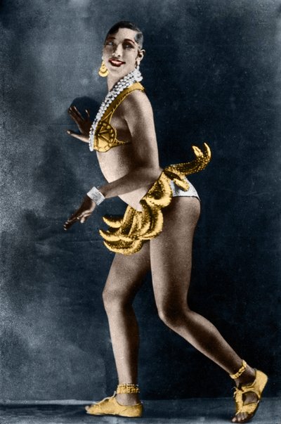 Josephine Baker (1906-1975) in 1925 in the Revue Negre at the Theatre des Champs-Elysees, with her banana belt. Photograph by Lucien Walery (1863-1935). by Walery