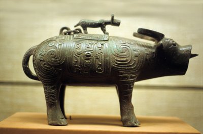 Ox-shaped Wine Vase Surmounted by a Tiger by Western Zhou Dynasty Chinese School