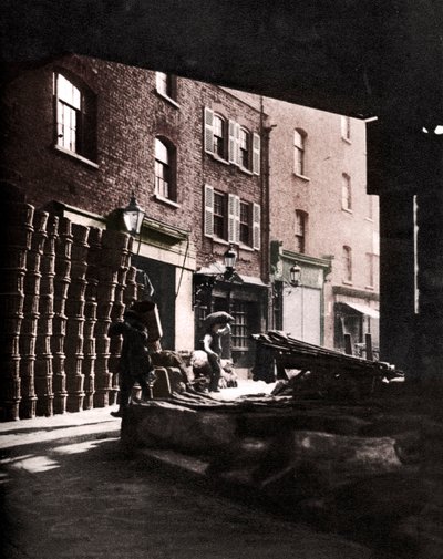 Fruit Baskets Piled Against Houses at Borough Market, London, 1926-1927 by Whiffin