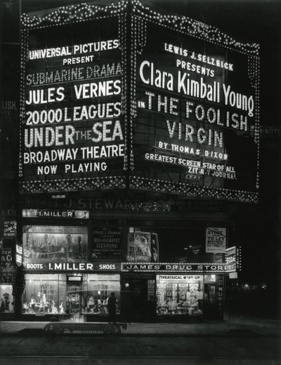 1554 Broadway at 46th Street, I. Miller Shoes; James Drug Store, and Large Marquees for Movies Lit Up Above by William Davis Hassler