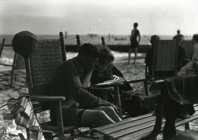 Couple Reading on Beach, Coney Island, c.1910-21 by William Davis Hassler
