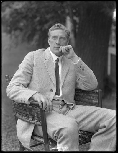 English Boxer William Thomas Wells (Bombardier Billy Wells), Posed Seated in a Tweed Suit by William Davis Hassler