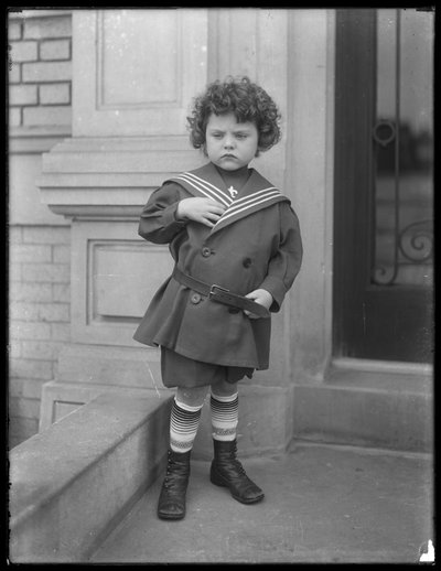 Little Boy in Sailor Suit on Front Stoop of Vermilyea Avenue Apartment Building by William Davis Hassler