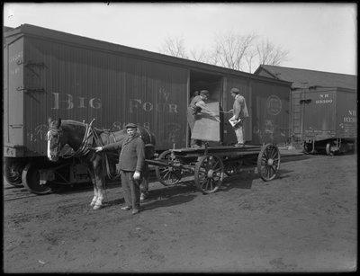 Men Measuring and Inspecting Lumber for Use in Casket Manufacture, Oneida, New York by William Davis Hassler