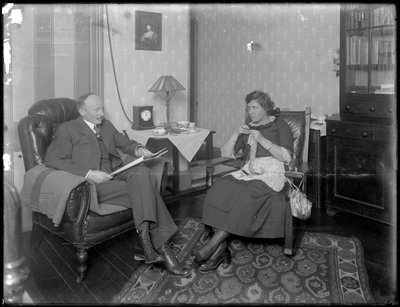Mr. and Mrs. Austin Norris in unidentified living room by William Davis Hassler