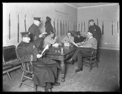 Officers Relaxing in an Unidentified Police Station, c.1913-14 by William Davis Hassler