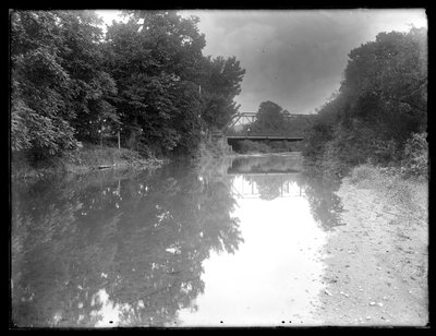 River with bridge, possibly in Meadsville, Pennsylvania by William Davis Hassler
