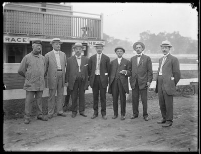Seven Unidentified Men Pose Near a River or Lake by William Davis Hassler