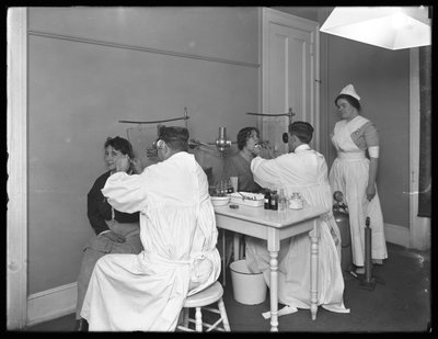 Two patients being examined, Examining room #1, Seton Hospital, Spuyten Duyvil, Bronx by William Davis Hassler