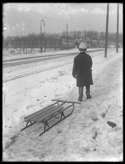 William Gray Hassler with his new sled, c.1912 by William Davis Hassler