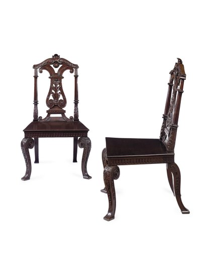 Pair of George II hall chairs, executed by James Moore the Younger, c.1727-31 by William Kent