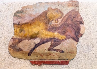 Detail of a Roman mural of a lion attacking a horse by . .