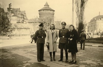 World War II (1939-1945): Two German soldiers posing with their companion or spouse in the city of Tours, France by Frederick (attr. to) Barnard