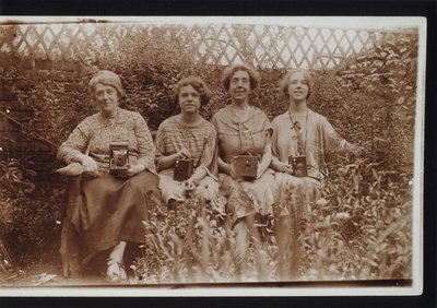 Four women with Kodak cameras, including Brownie cameras, c 1900s by Frederick (attr. to) Barnard