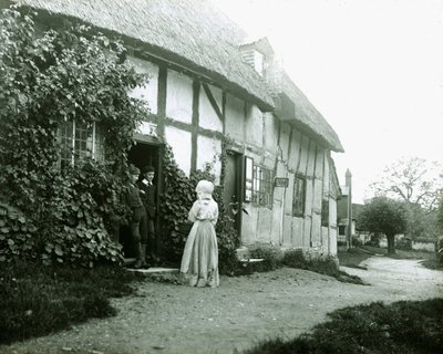 People at a Cottage Door by Frederick (attr. to) Barnard